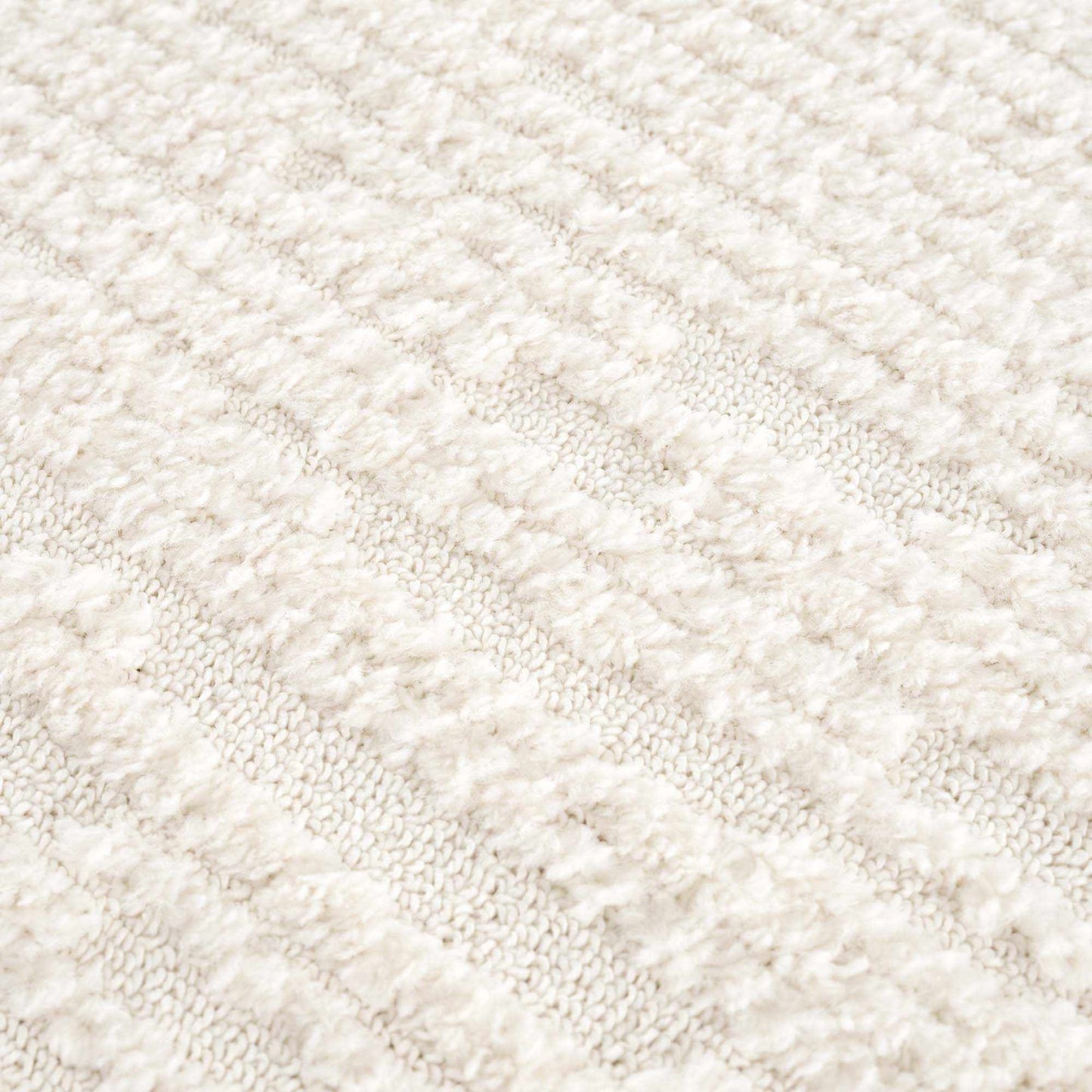 Kulu Textured Area Rug with Tassels