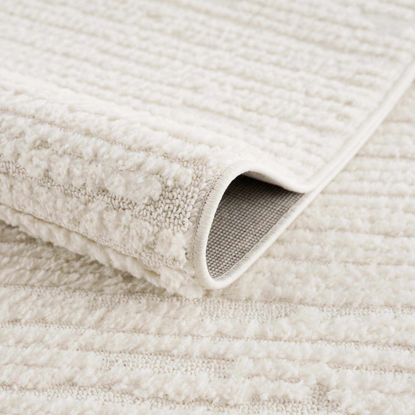 Kulu Textured Area Rug with Tassels