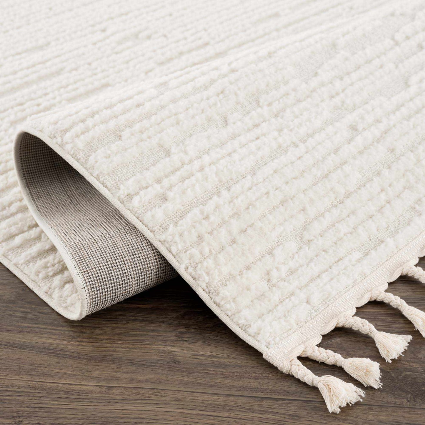 Kulu Textured Area Rug with Tassels